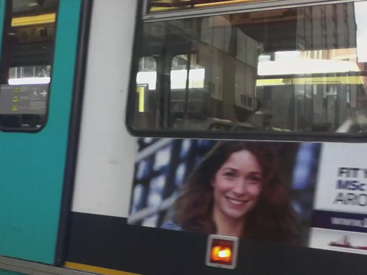 This is a picture of a train. On the left there is gate. At the top there is a window, in the...