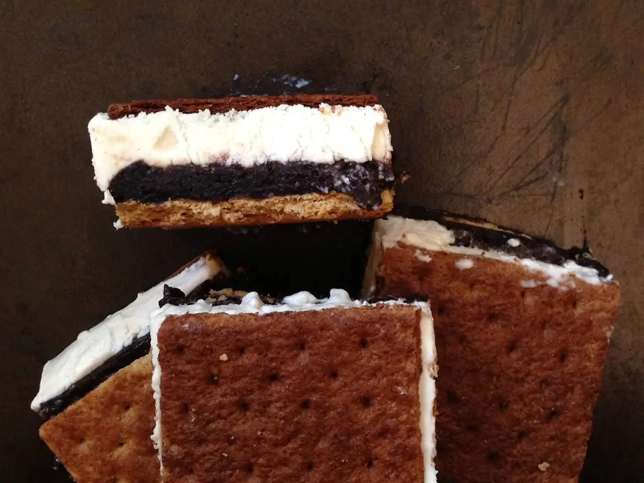 In this image, we can see pieces of cake.