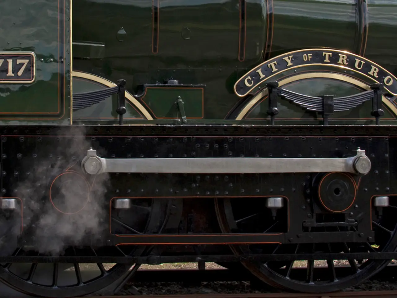 In this image there is a train on a track.