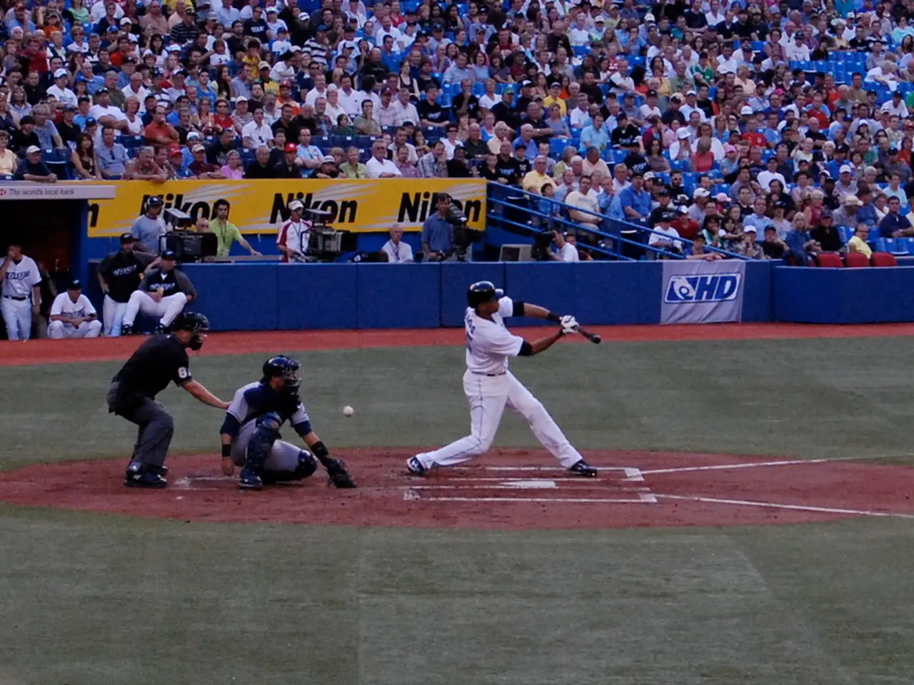 This picture describes about group of people, few are playing baseball game in the ground, in this...