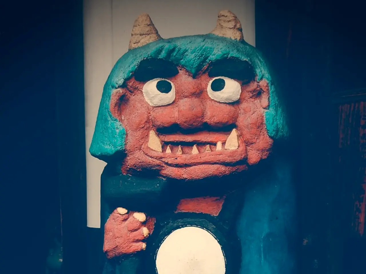 In this image there is a statue of a person.