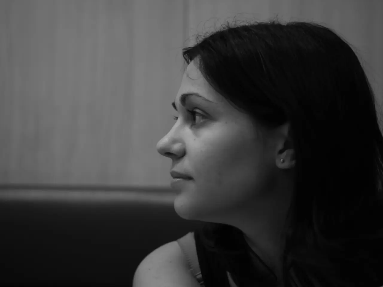 This is black and white picture of a woman.