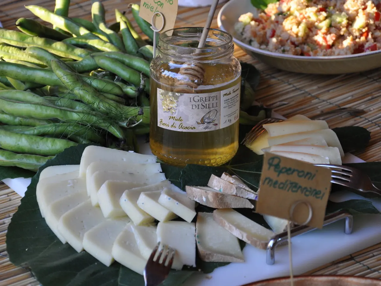 In this image I see beans over here and I see a jar in which there is some liquid and I see a...