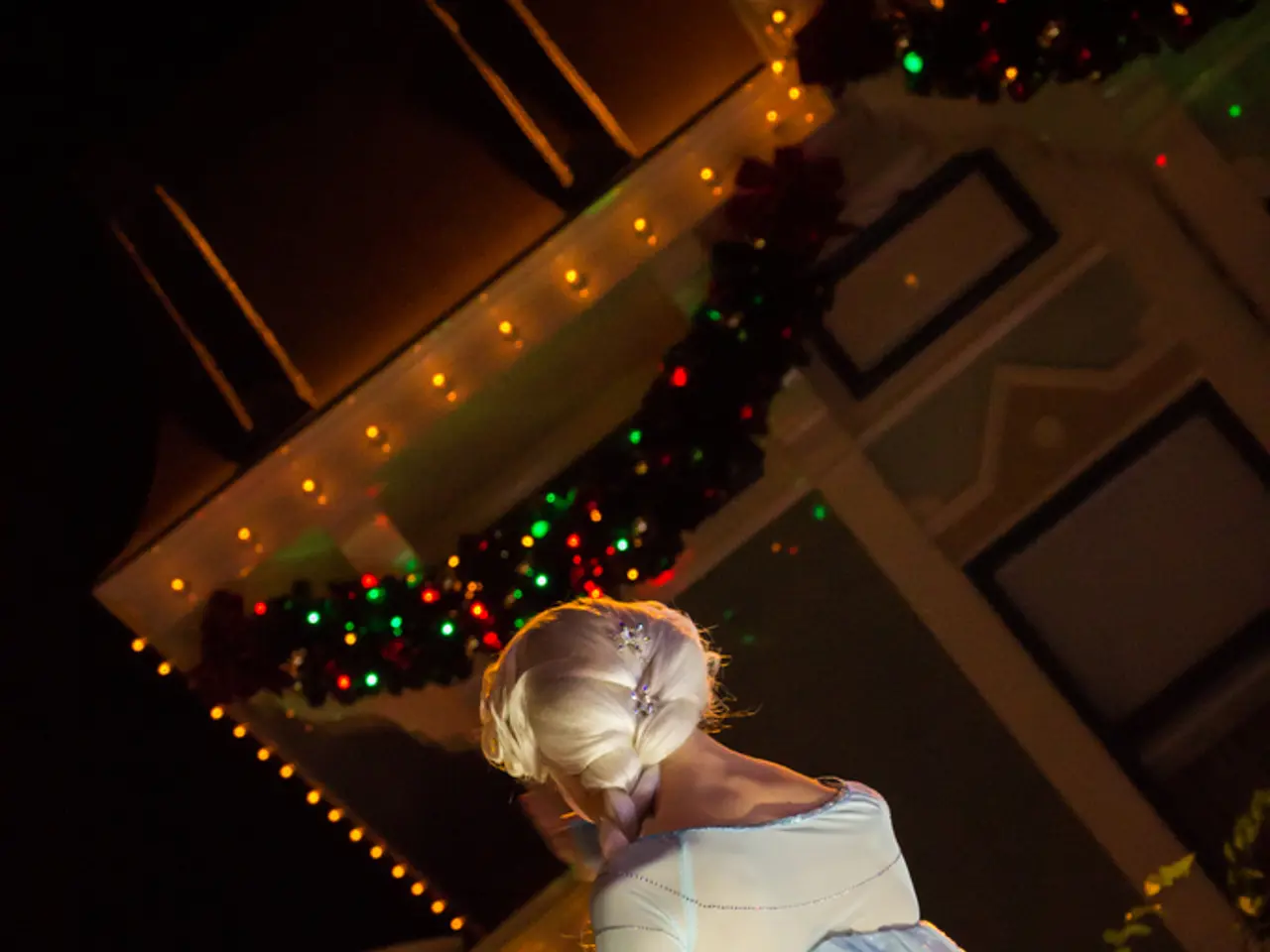 In this picture we can see the walls are decorated beautifully with lights and decorative items. We...