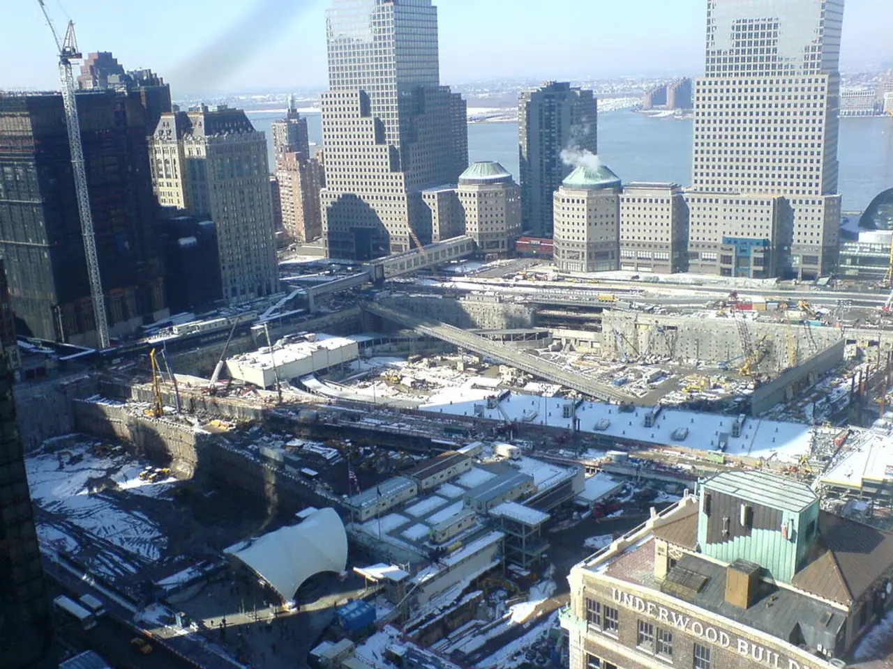 Here in this picture we can see an aerial view of a place and we can also see number of buildings...