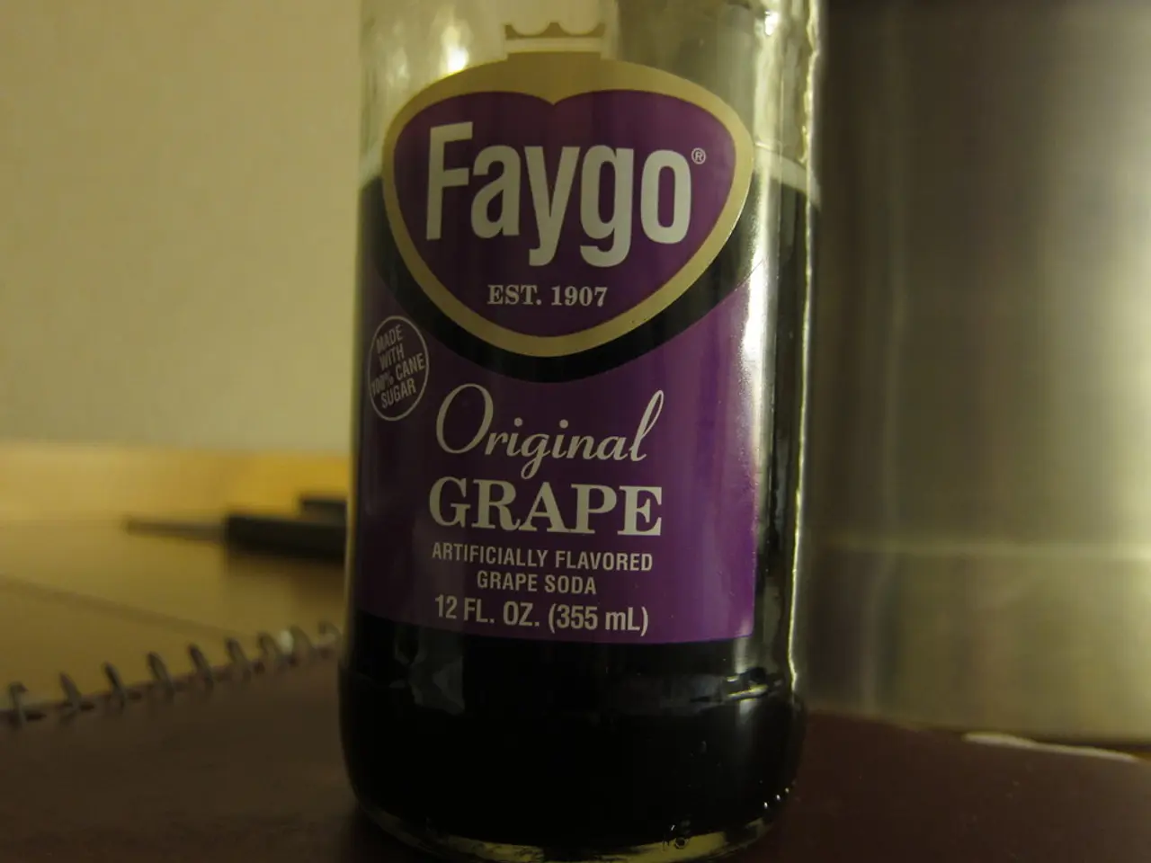 There is a bottle in the image. Which is labelled as faygo and filled with some liquid content...