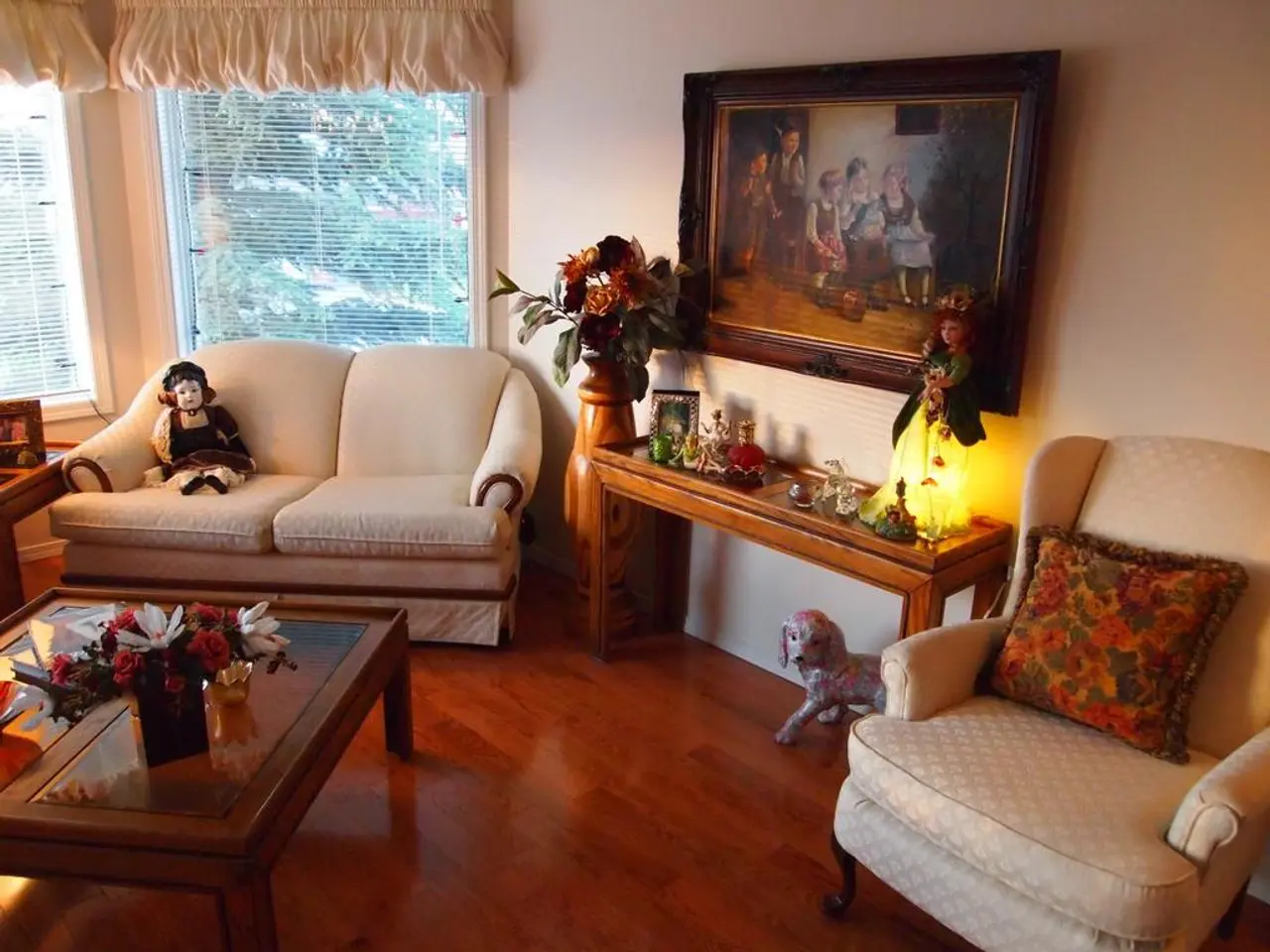 These are couches. On this couch there is a toy. On this couch there is a pillow. On this table...