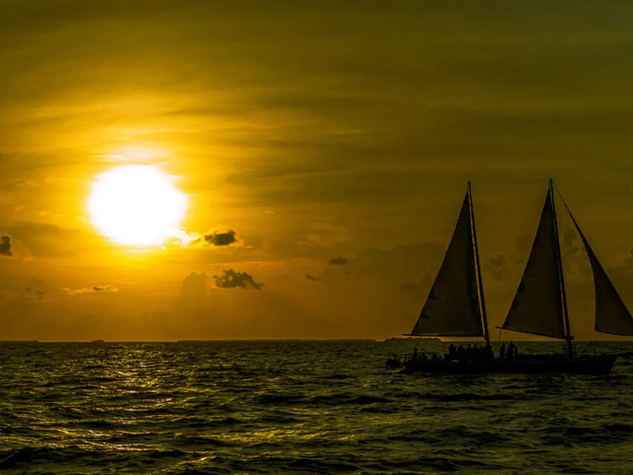 On the left side this is a sun, this is water, on the right side two ships are moving in this...