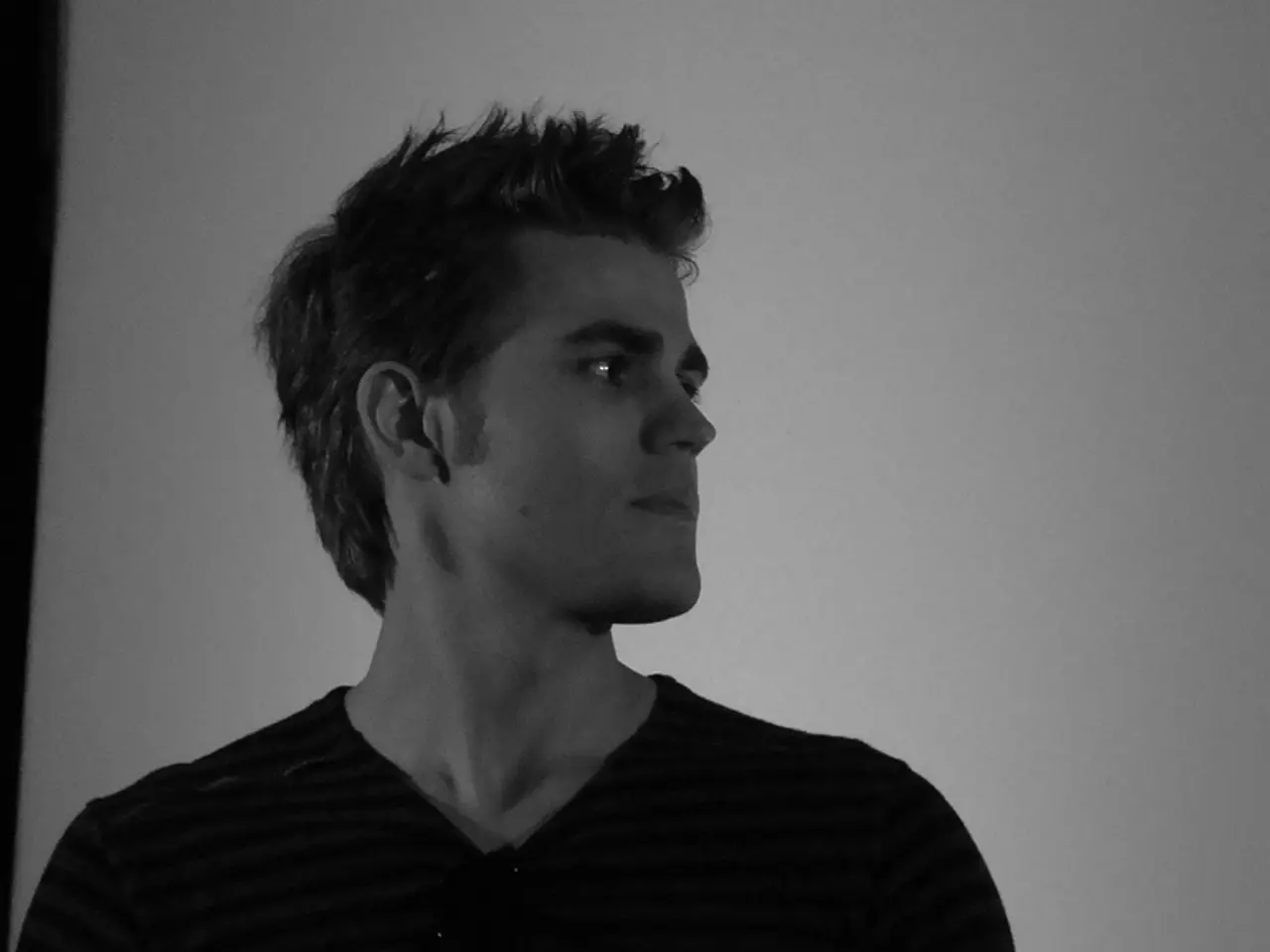 In this image I can see the person with the dress and this is a black and white image.