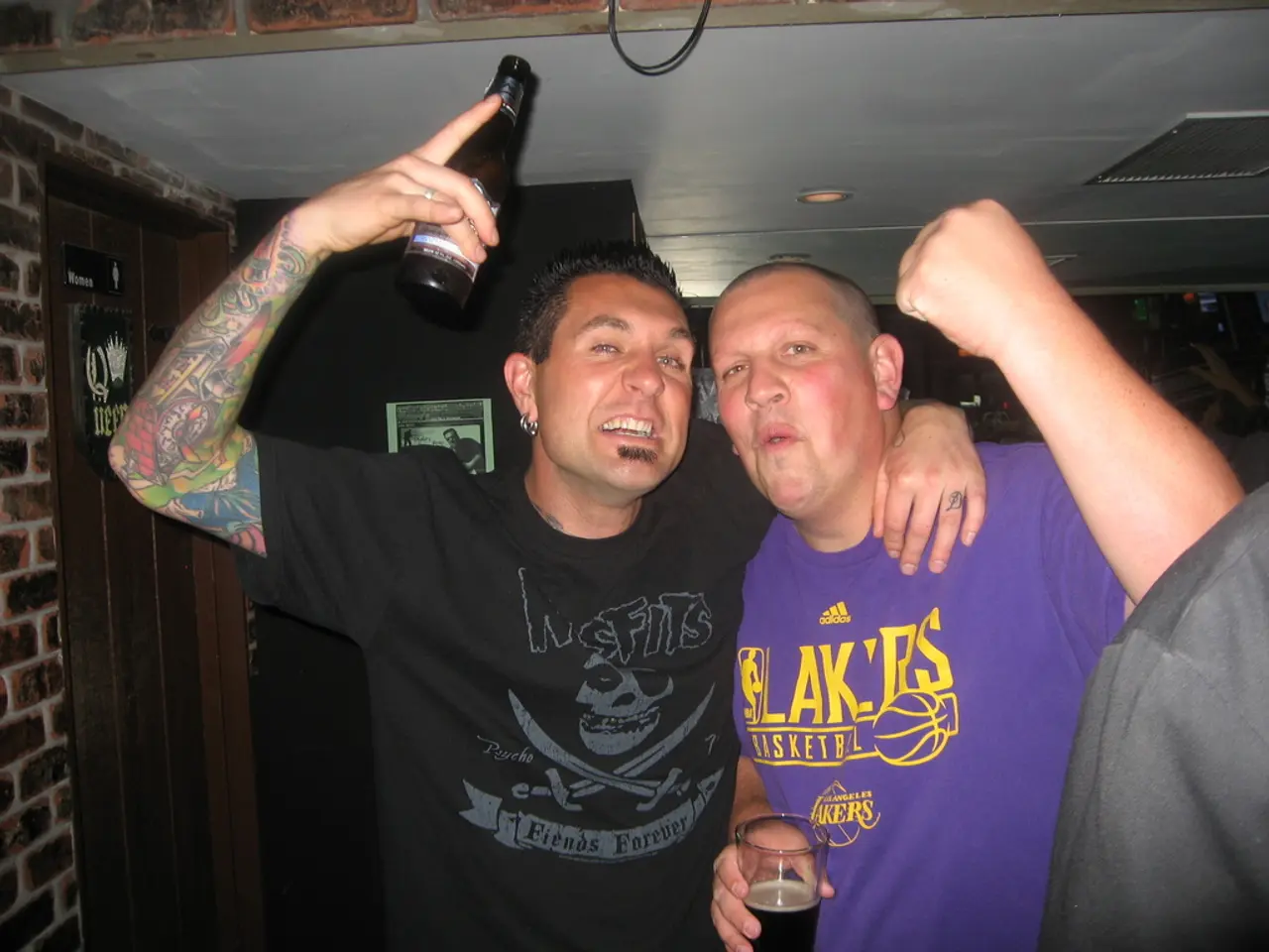 This picture describes about group of people, in the left side of the given image a man holding a...