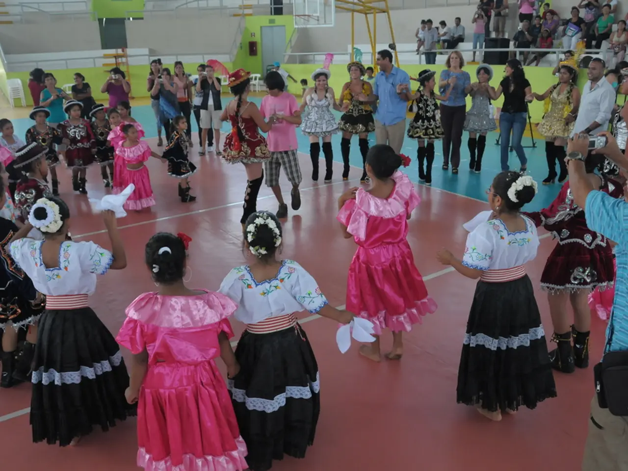 In this picture there are group of children those who are standing in the center of the image, in...