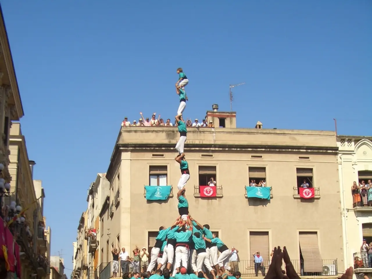 In this picture we can see group of persons who are wearing green t-shirt and white trouser and...