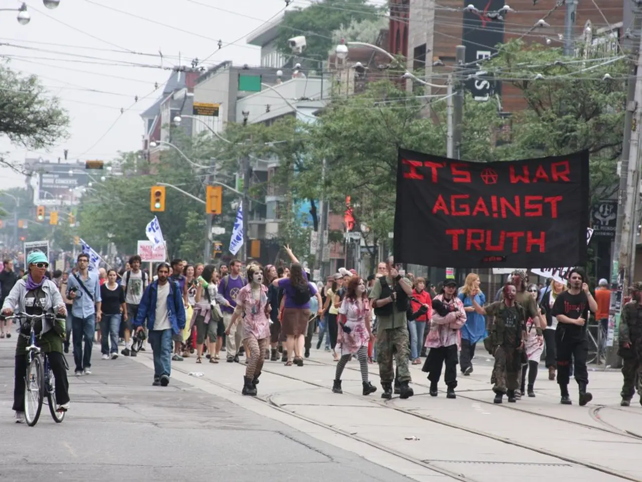 In the picture there is stadium in which many people are sitting on the chair some people are...