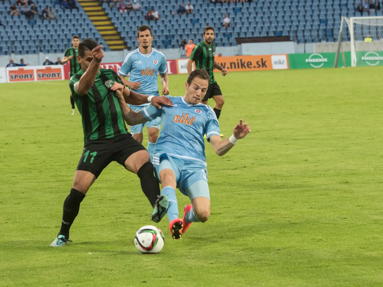 In this picture there are people playing a game and we can see ball on the grass, net and...