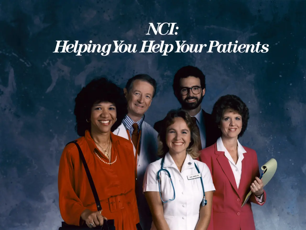 The image shows a group of people standing and smiling, with the text "NCI Helping You Help Your...