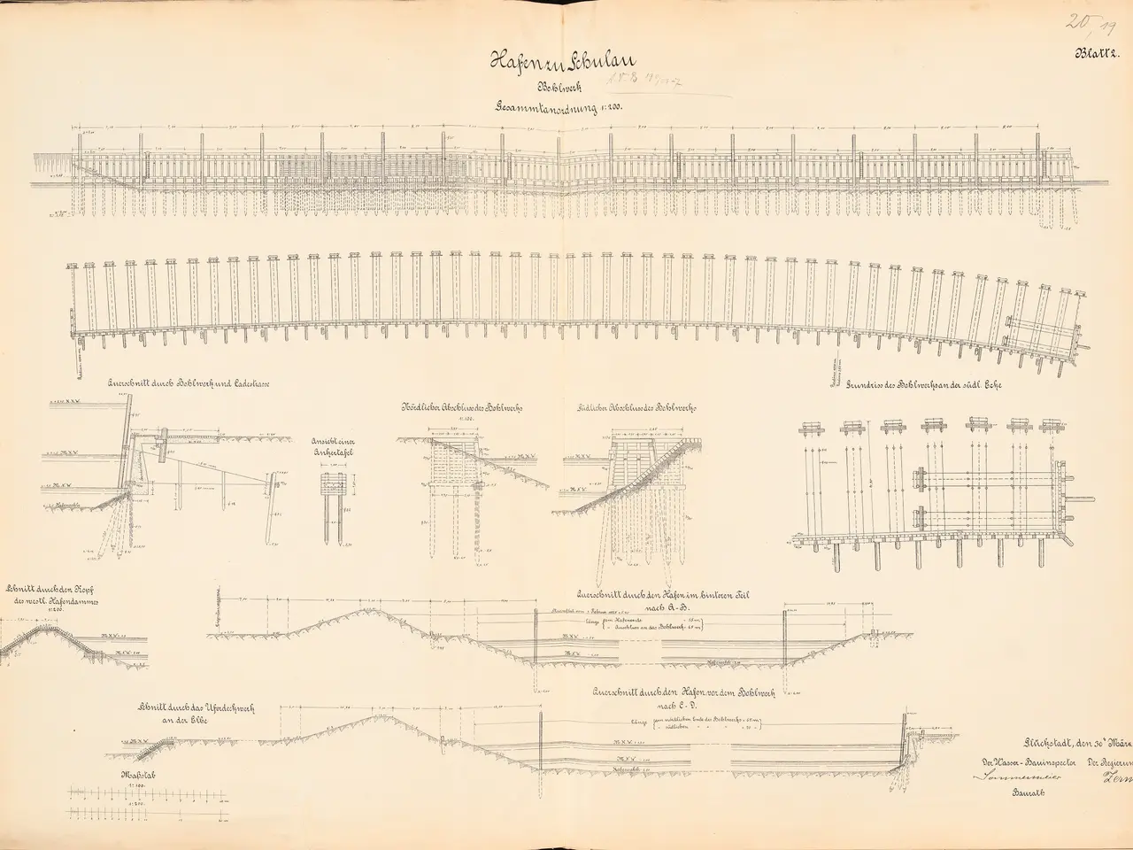 The image shows an open book with a drawing of a train track on it. The book is filled with...