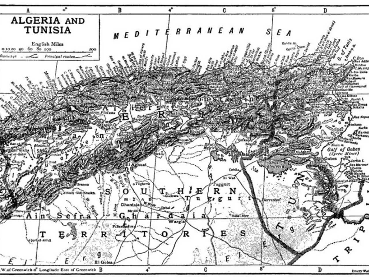 The image shows a black and white map of Algeria and Tunisia, with text written on it. The map is...