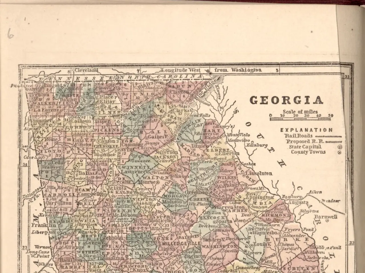 The image shows an old book with a map of Georgia on it. The map is detailed and shows the various...
