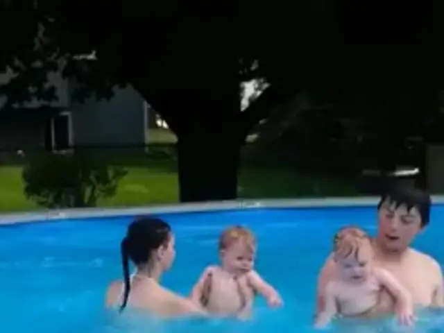 Ed Westwick and his wife Amy Jackson display affection in a beach photo, both adorned in swimwear,...