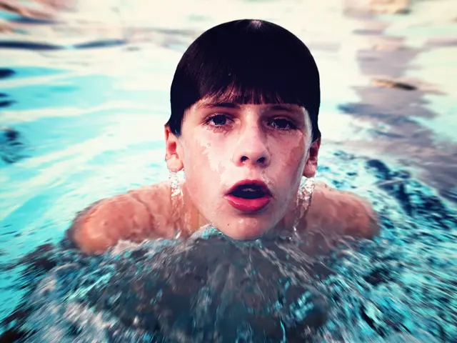 Child submerged in open-sea water