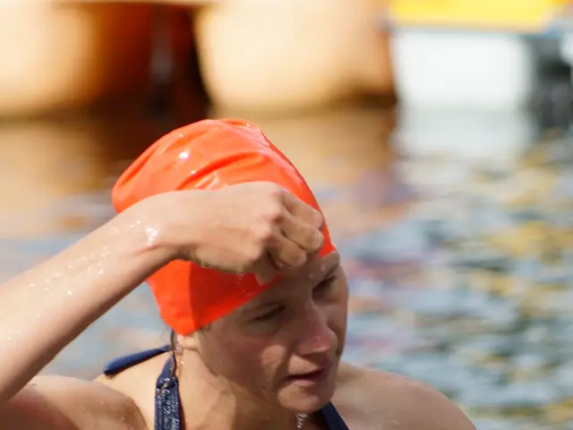 "Ilka Bessin displays bare top in pool outing"