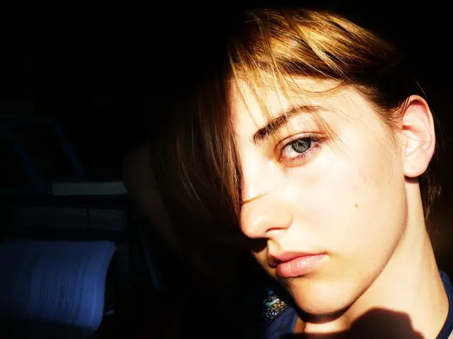 Visualizing recent fashion trends, Pamela Anderson's midnight blue gown stands out as one of her...