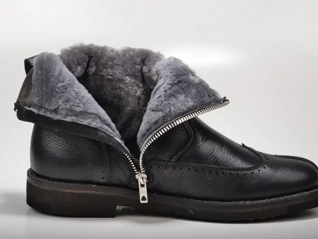 Anti-athleisure shoe trend showcased by Julia Garner as she pairs them with leggings in New York...