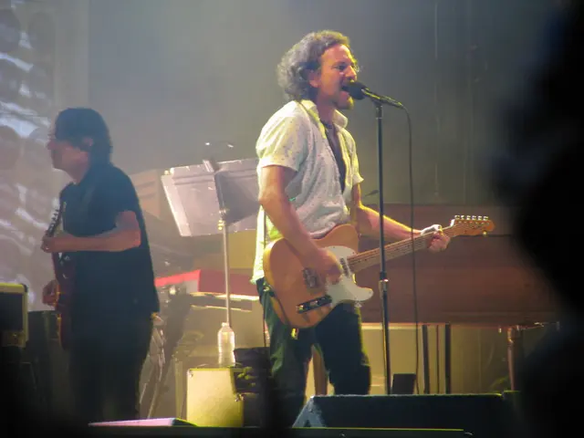 "Brian May expresses dissatisfaction with his guitar performance in Bohemian Rhapsody during The...