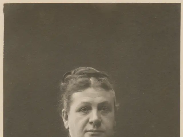 actress Margot Robbie highlights her stunning legs in a deep-cut, long thigh-split dress.