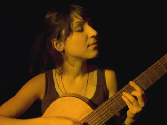 Ally Venable aspires to mimic Stevie Ray Vaughan's style and attempts to shatter her guitar,...