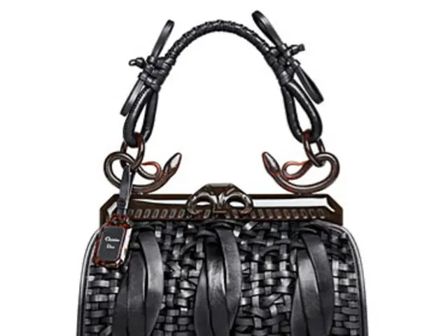 Actress Laura Harrier Continually Chooses The Row Handbag, Affirming It's Not Margaux Model