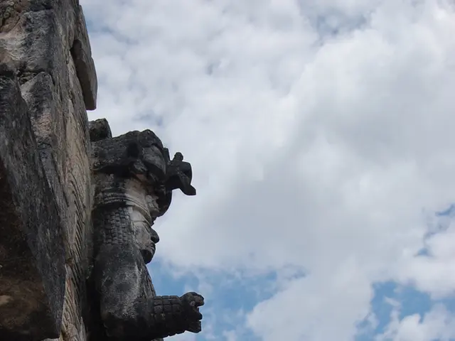 In this image, I can see the ancient sculpture from an archaeological site. These are the clouds in...