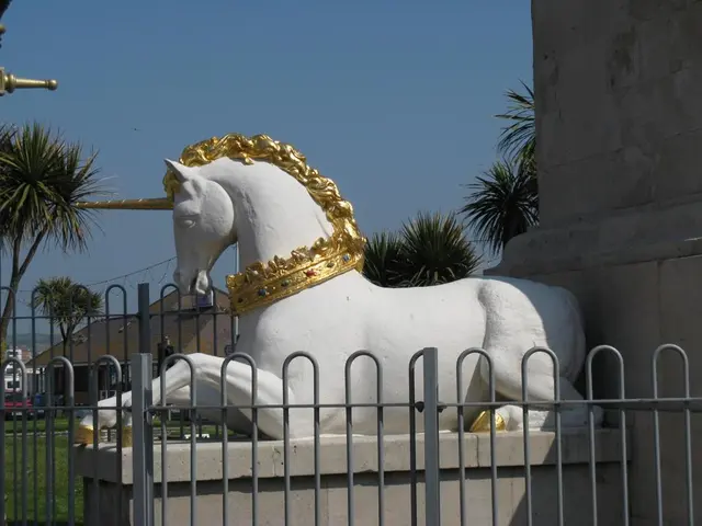 In the center of the image there is a horse statue. At the background of the image there is a...