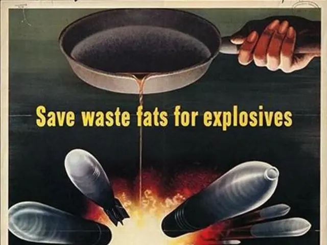 This image is a poster. In this poster we can see a person's hand holding a pan and there is text....