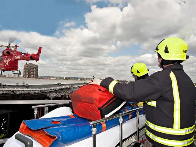 In this image there are few buildings in which there are two persons wearing helmets and standing...