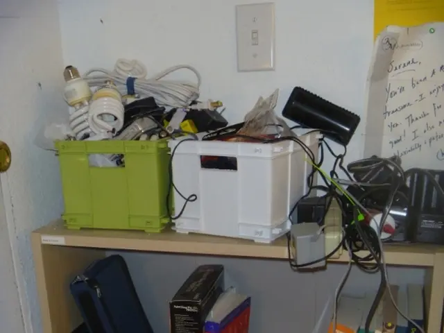 In the picture I can see bookshelves, on the top of the shelf there are boxes places along with...