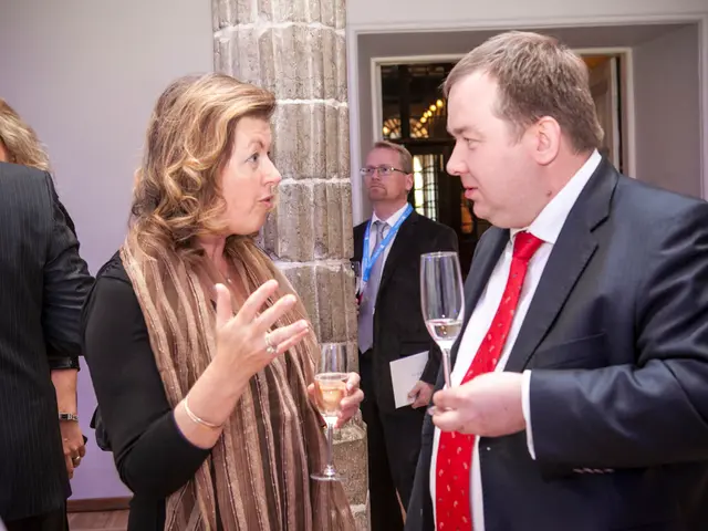 This picture is clicked inside the room. On the left corner of the picture, we see a man wearing...