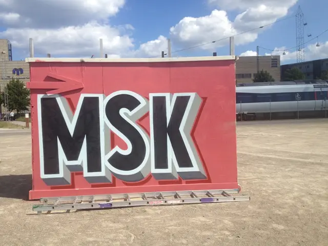 In this picture there is a sign board in the center of the image, there is a ladder in front of it,...