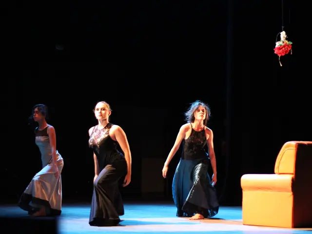 In this picture we can see there are three women dancing on the floor and on the right side of the...