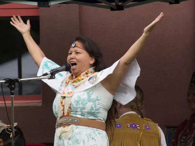 In this picture we can see a woman wearing a white dress, standing on the stage and shouting in the...