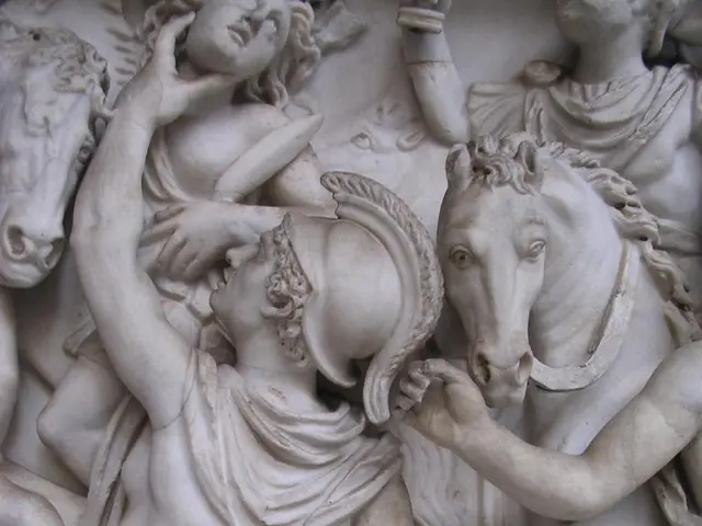 In this picture there are sculptures of group of people and there are sculptures of horses.