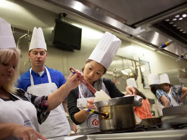 In this image there are group of persons standing. In the front on the left side there is a woman...