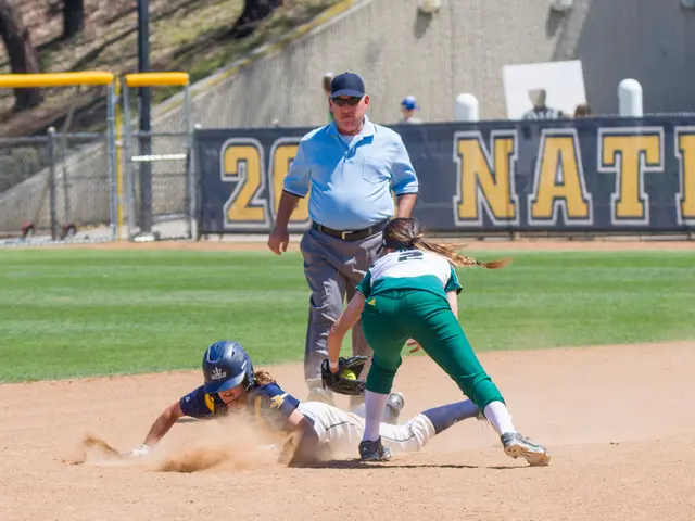 This is a picture taken during a baseball game. This is a picture which consists of a baseball...