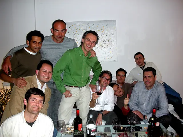 In this picture I can see there are a group of people standing here and there are some of them...