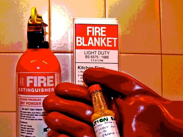 This picture is of inside. On the right we can see a red color sculpture of a hand and a bottle. On...