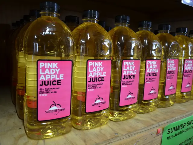 In the image we can see there are bottle in which there is fruit juice on it it's written "Pink...