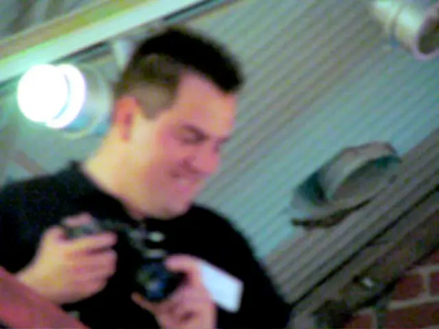 This is a collage image. In this image we can see men holding cameras in their hands.