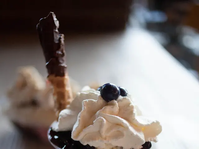 In the center of the image there is ice cream on the surface.