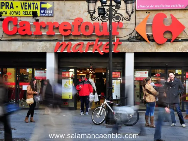 It is a shopping market, many people were standing in front of the shopping mall, there is a black...