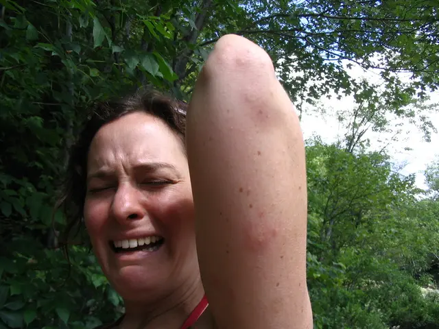 In this picture there is a woman standing and crying. At the back there are trees. At the top there...